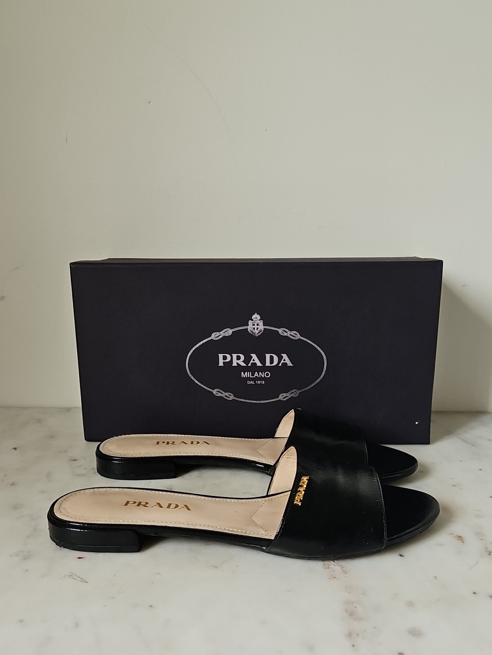 PRADA: Black Saffiano Leather Sandals